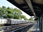 Q Train of R-68A cars approaching Neck Rd Station heading to 96th St in Manhattan